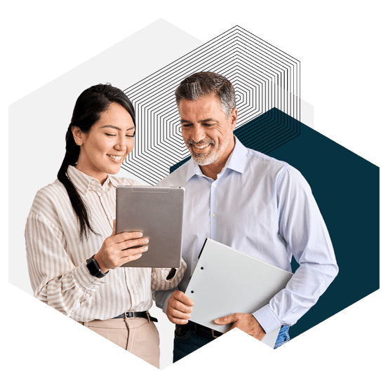 two corporate professionals collaborate using a tablet