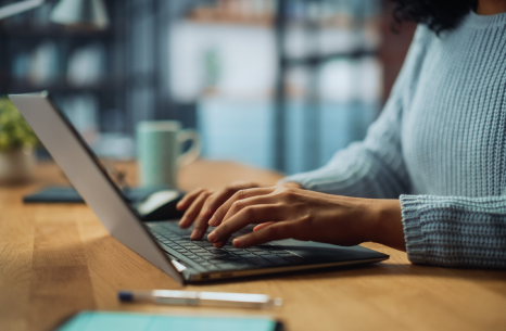 A person working front a computer