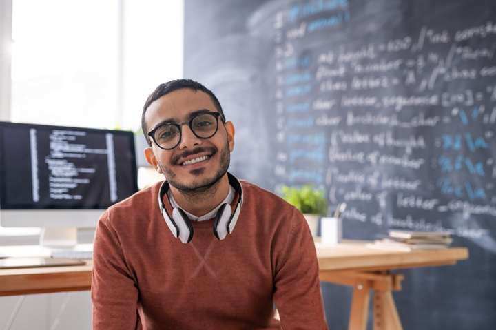 worker smiling-uipath competitor review