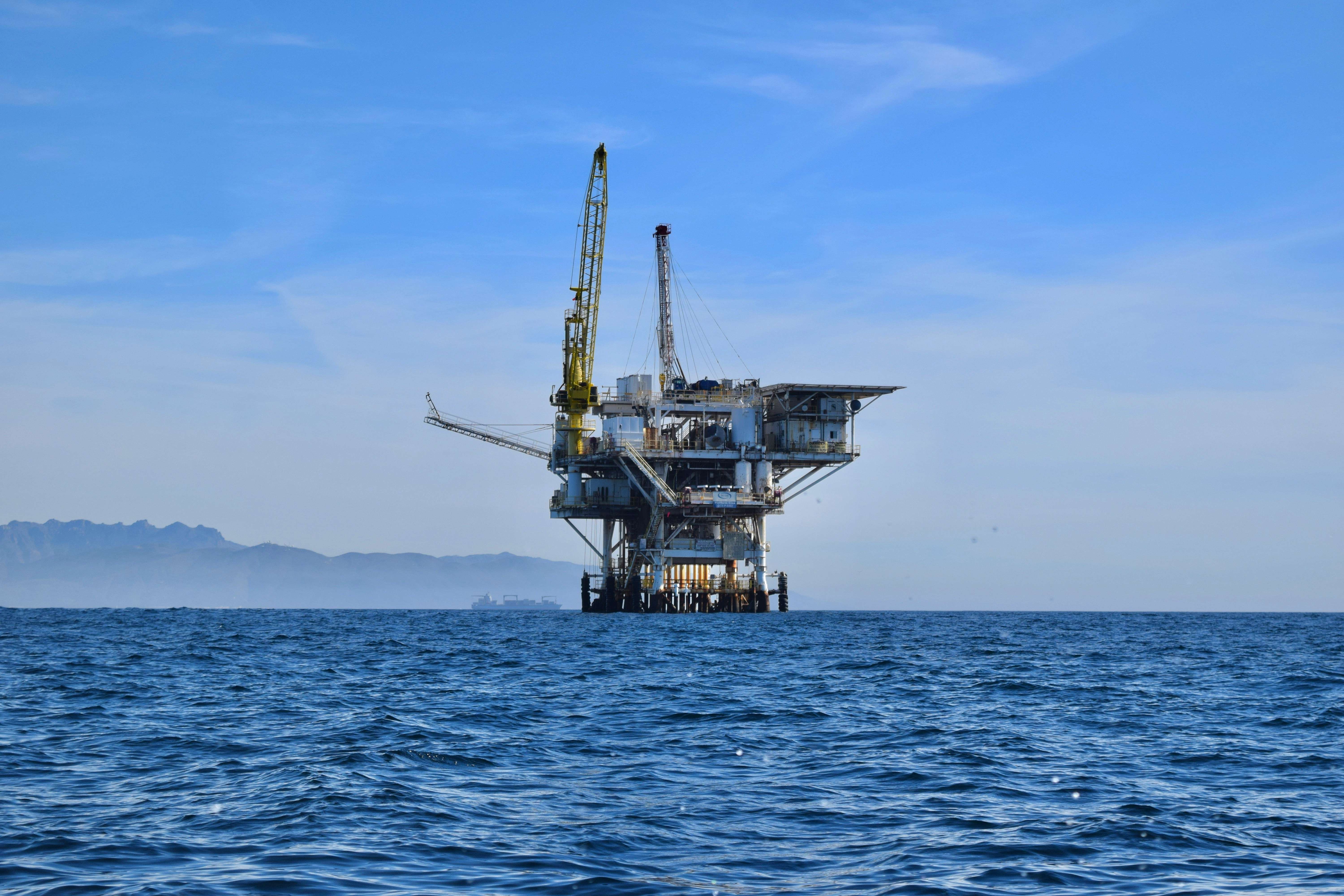 Technicians working at a remote oil and gas site
